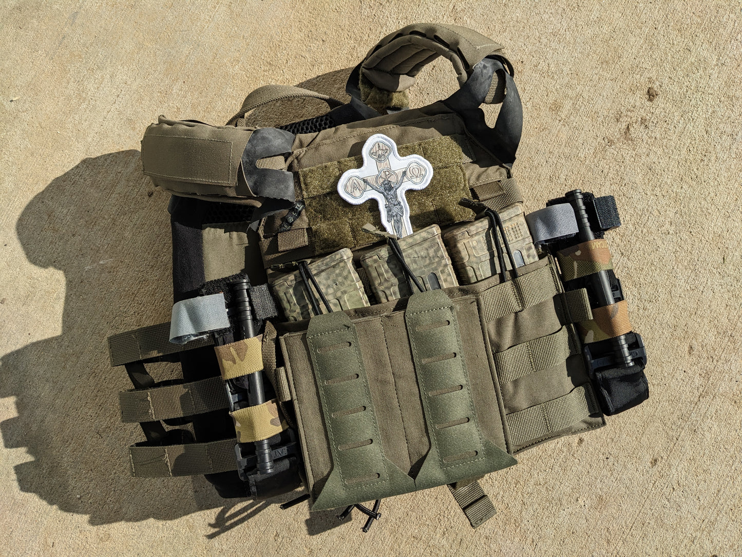 plate carrier with white crucifix patch