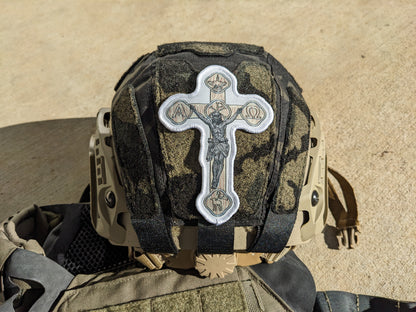 Helmet with white crucifix patch