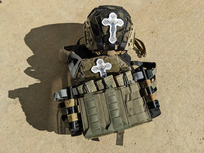 Plate carrier and helmet with white crucifix patch