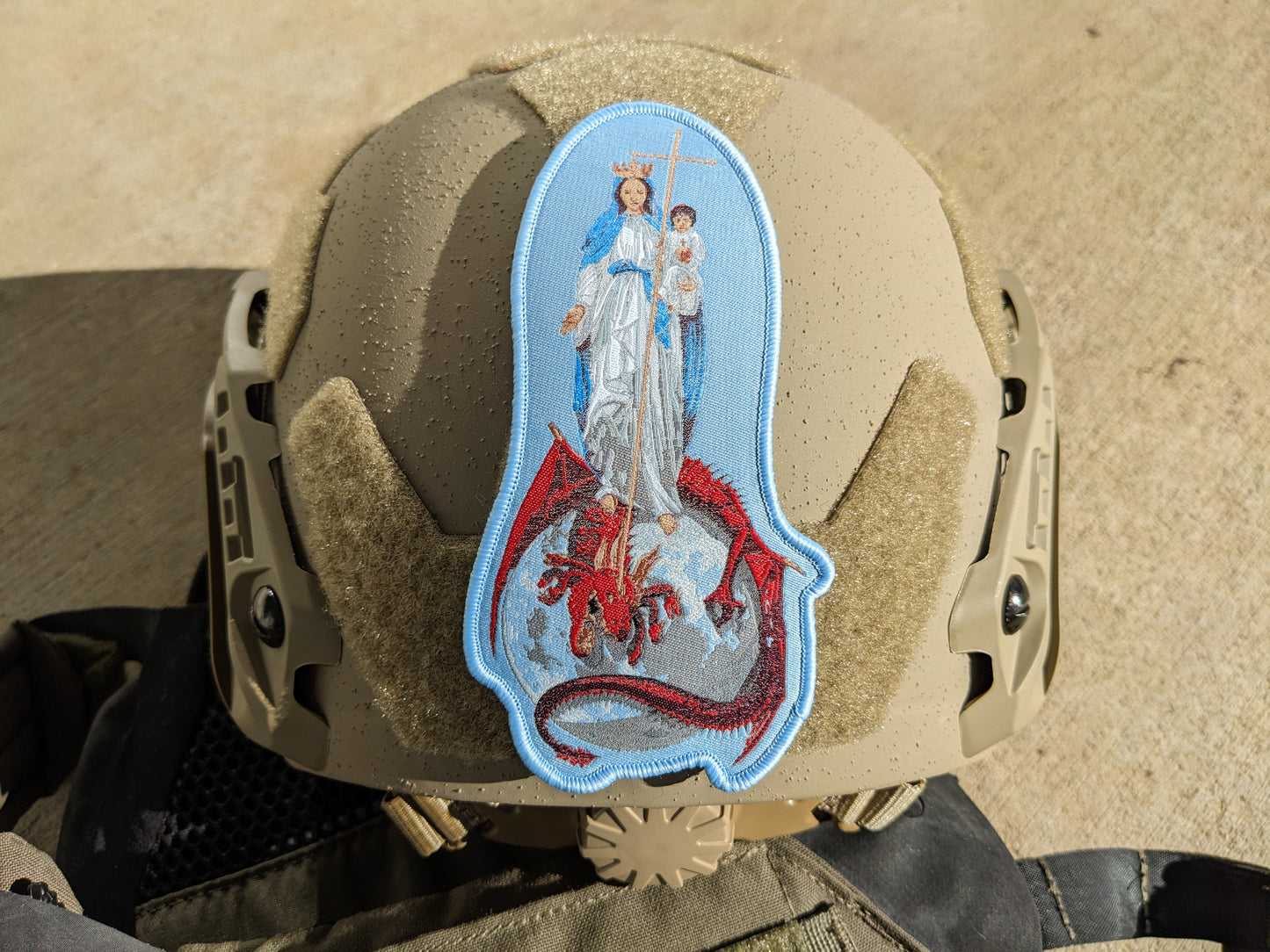 helmet with patch depicting the Blessed Virgin Mary with infant Jesus