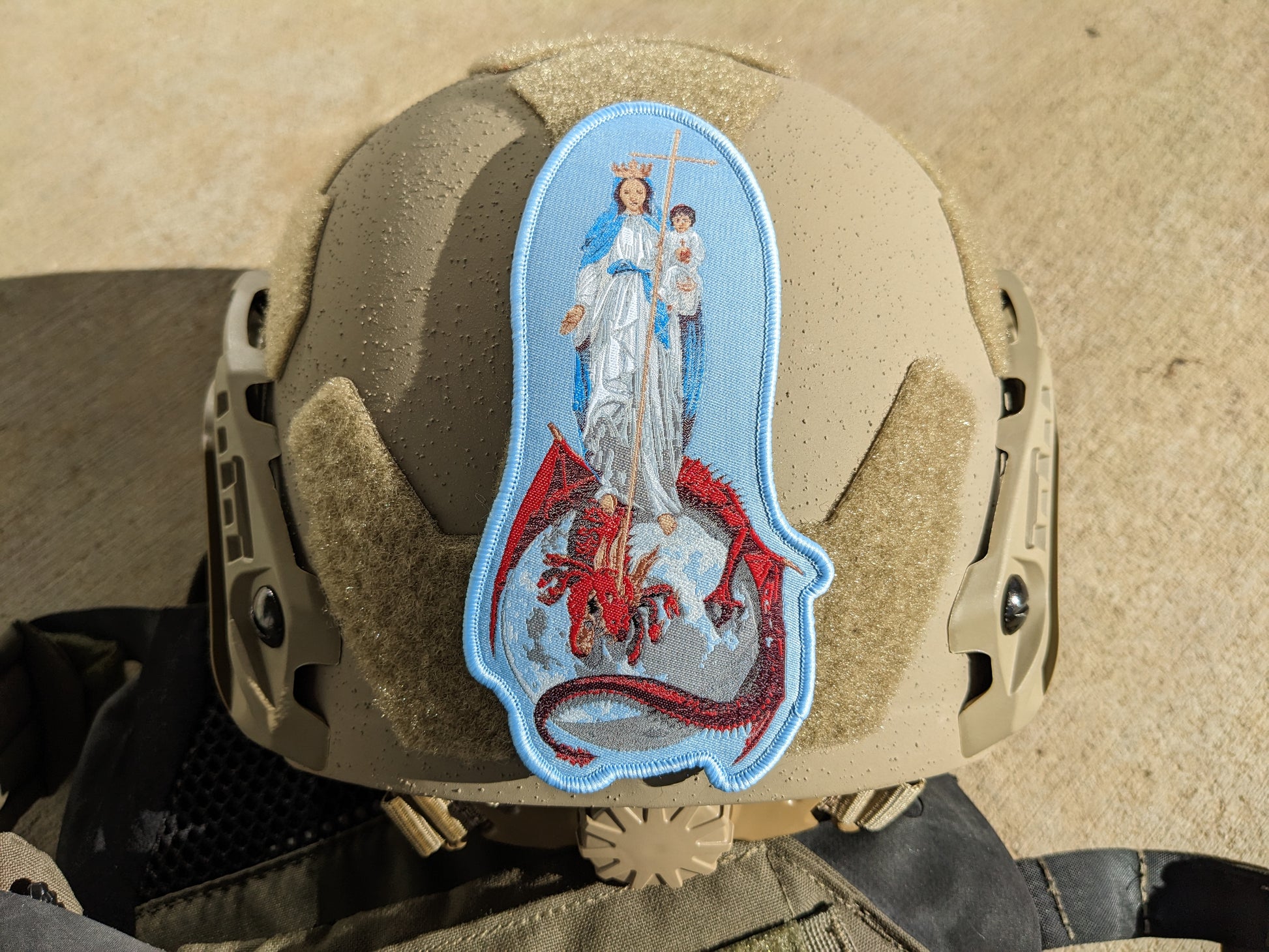 helmet with patch depicting the Blessed Virgin Mary with infant Jesus