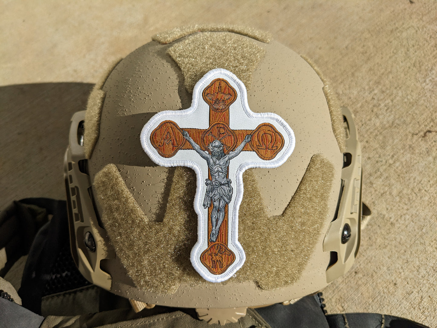 Helmet with brown crucifix patch