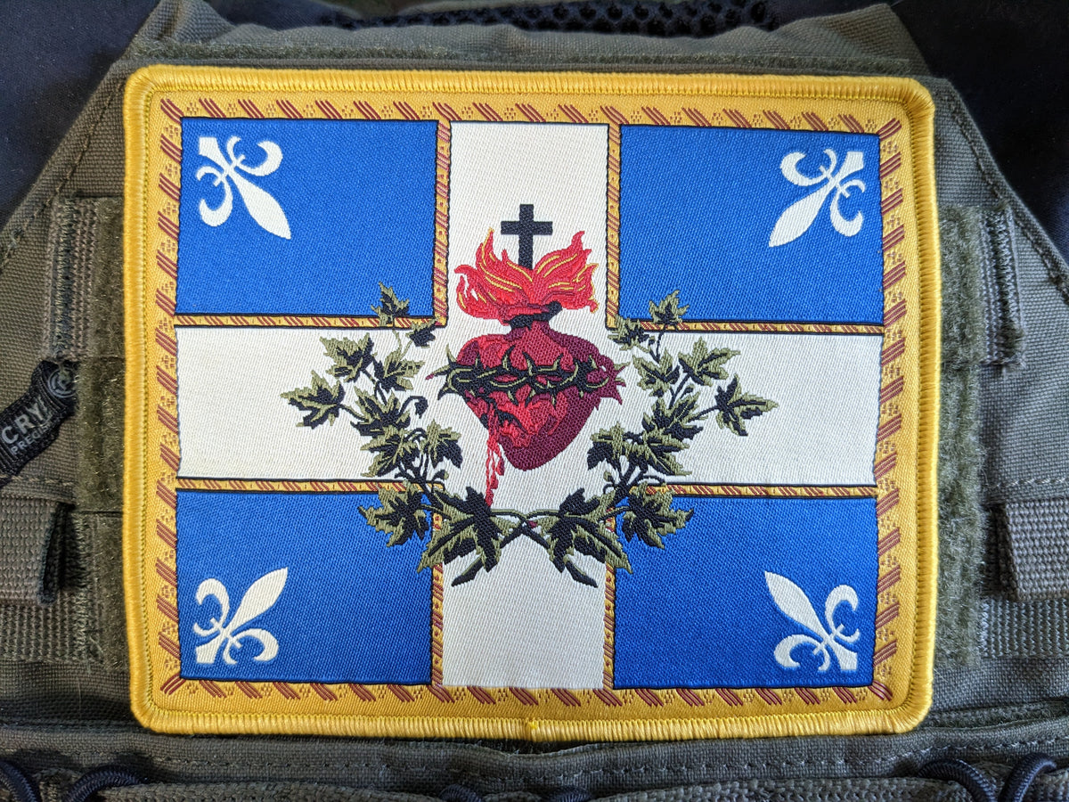 Sacred Heart of Jesus flag patch on a vest.